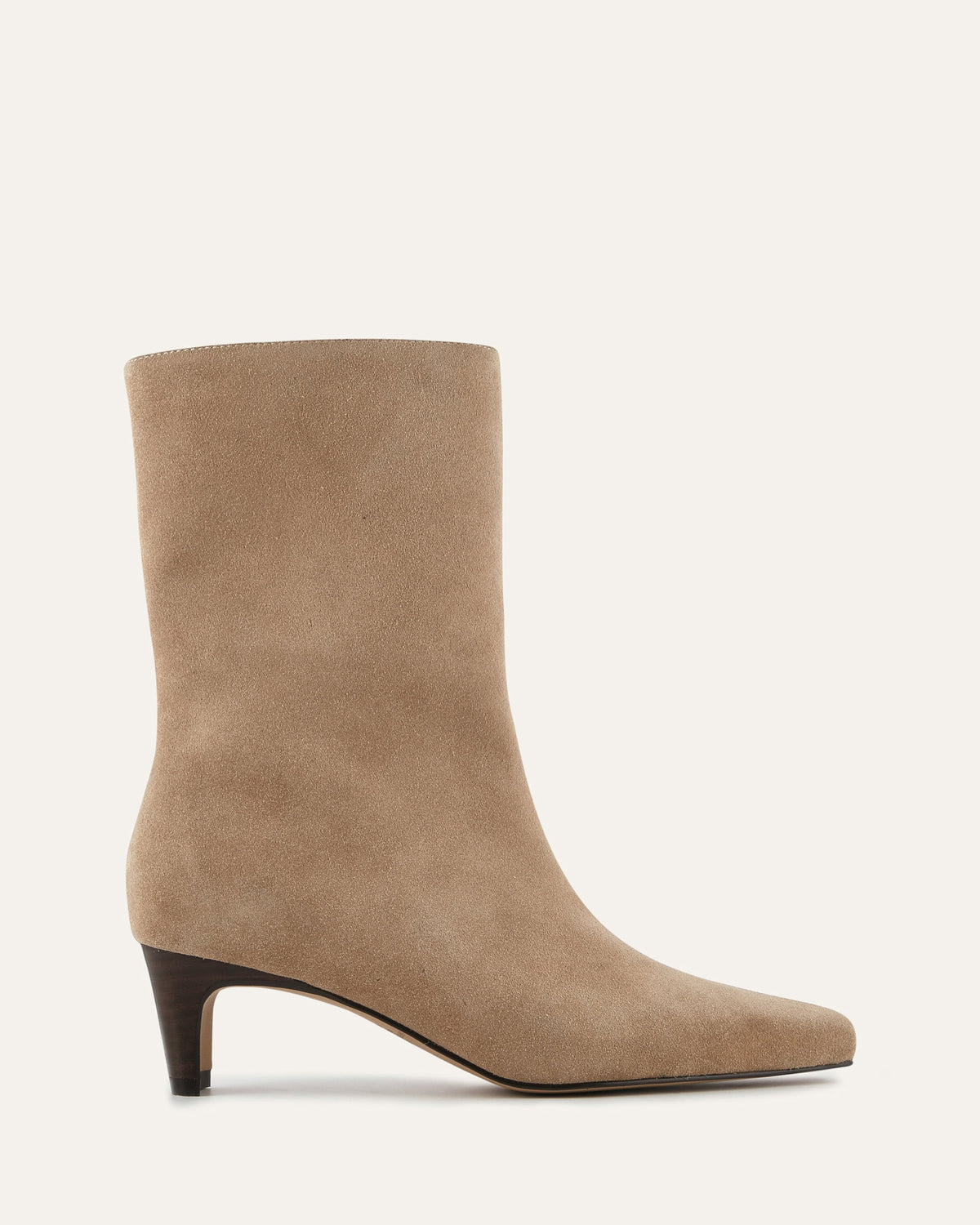 Beige ankle boot on a white background
