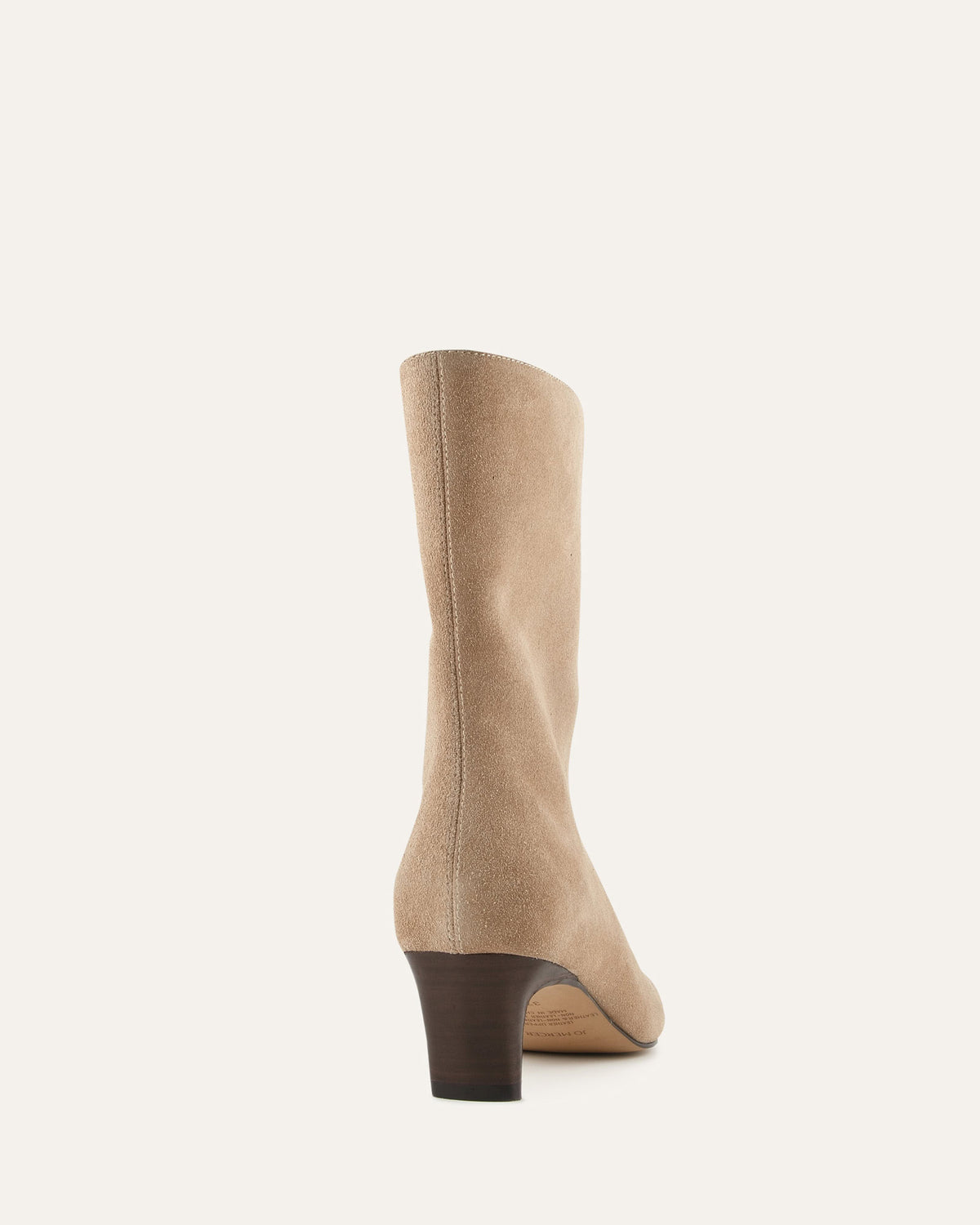 Beige knee-high boot on a white background