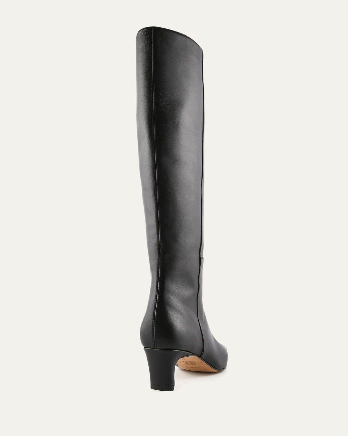 Black knee-high boot on a white background