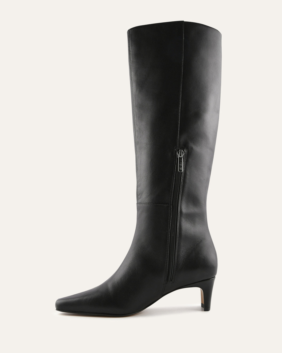 Black knee-high boot on a light gray background