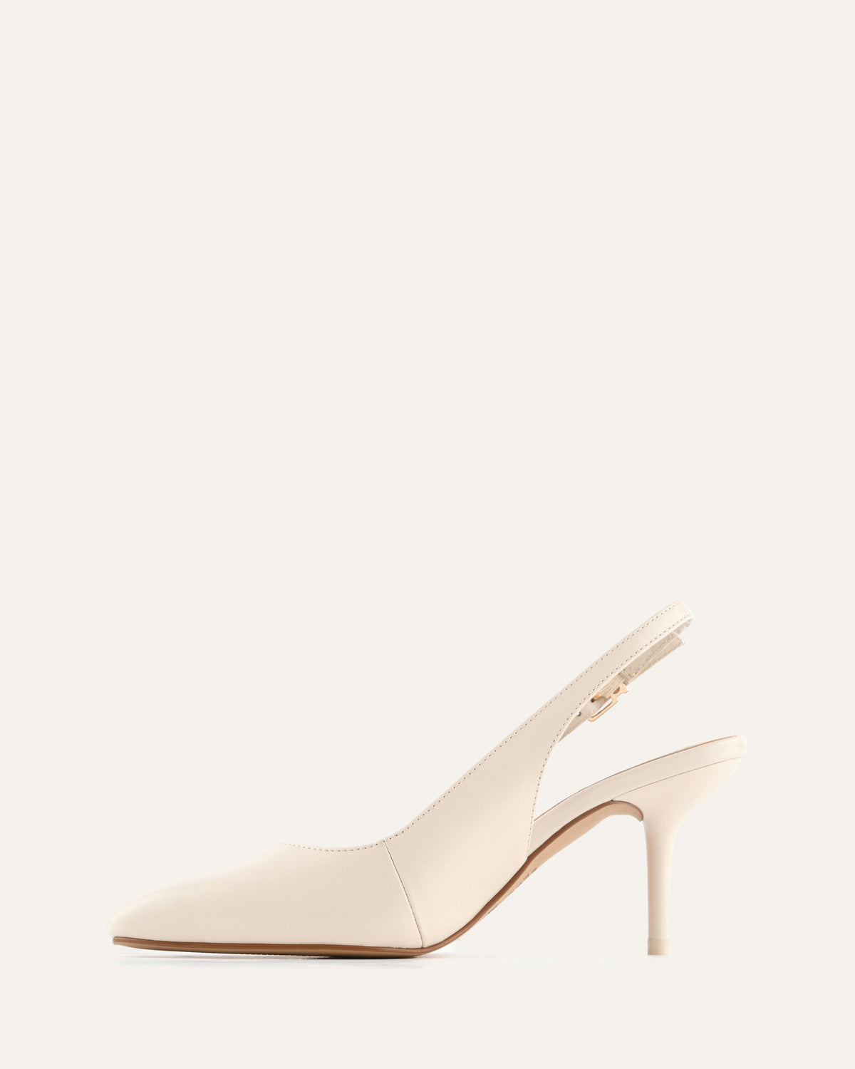 Beige high-heeled shoe on a white background