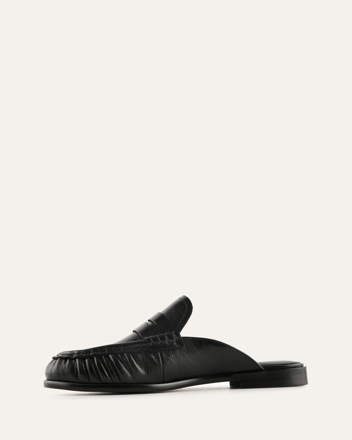 Black loafer shoe on a white background