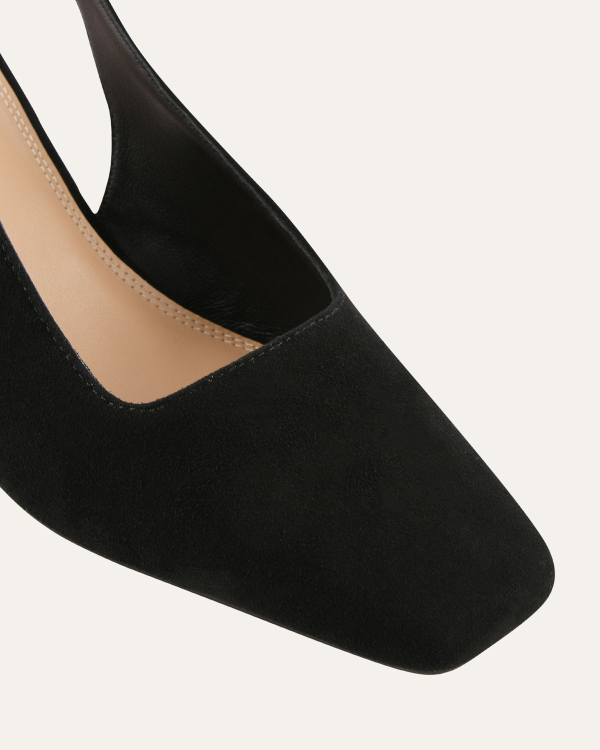 Black flat shoe on a white background