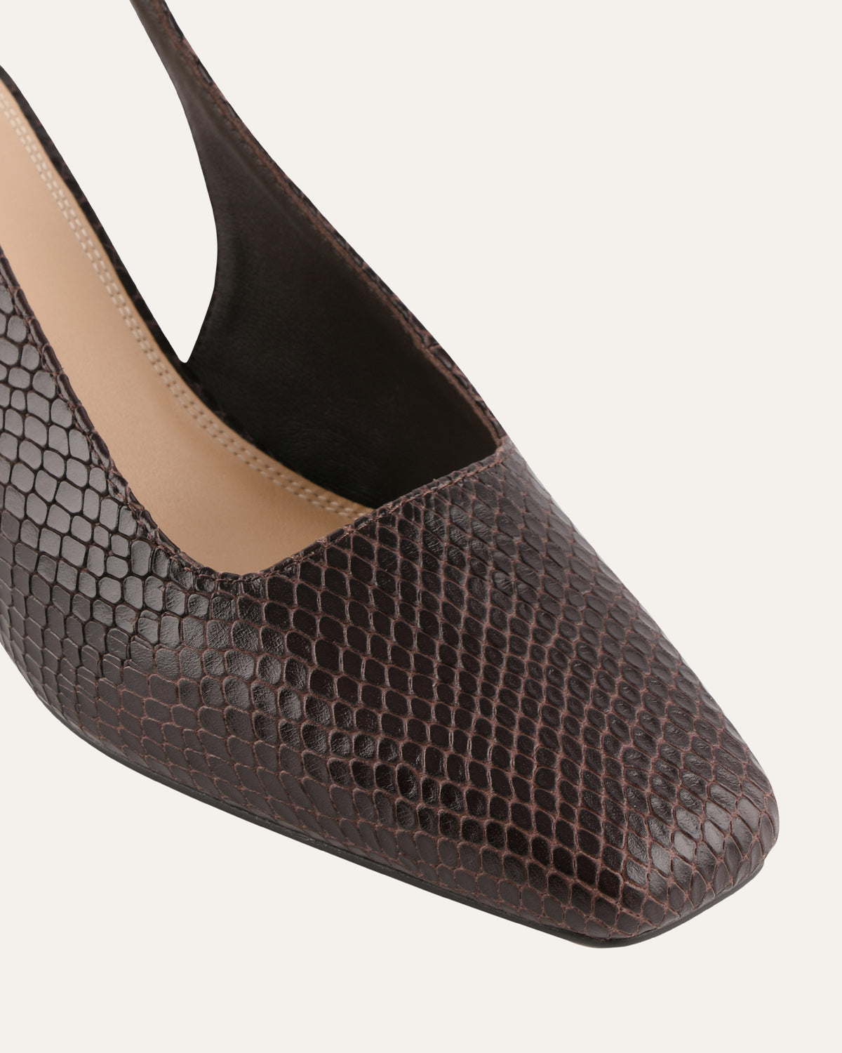 Brown textured shoe on a white background