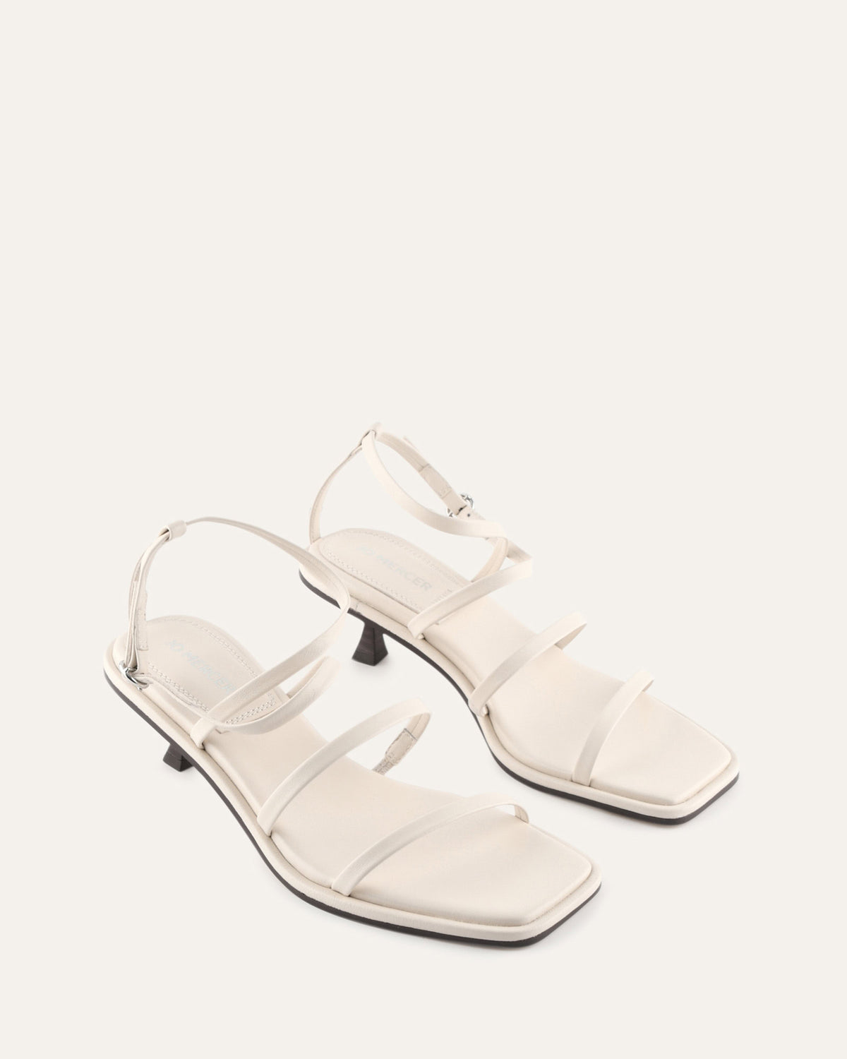TUCKER MID HEEL SANDALS OFF WHITE LEATHER