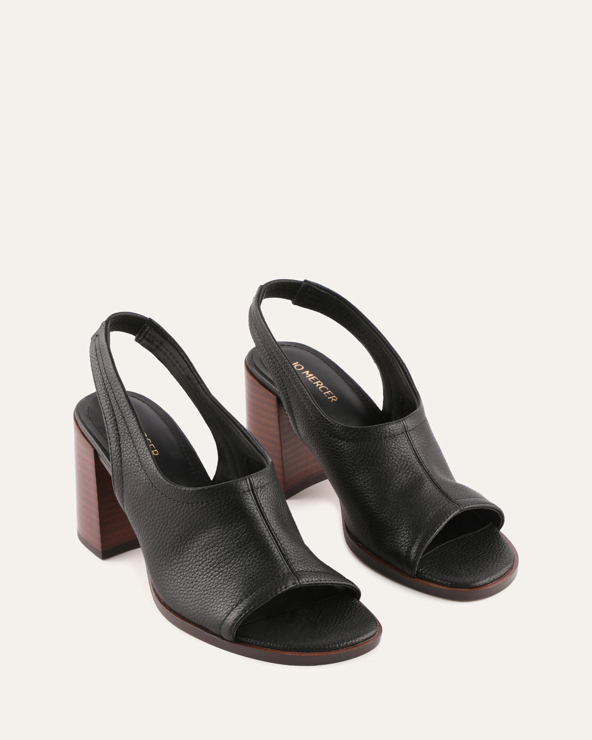 Black high-heeled shoes on a white background