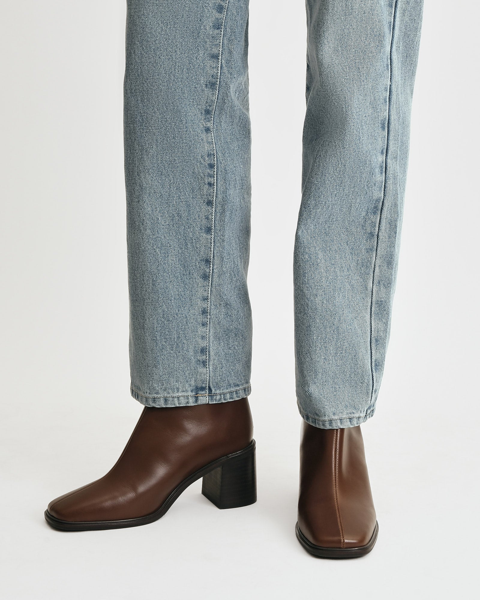 Brown ankle boot on a white background