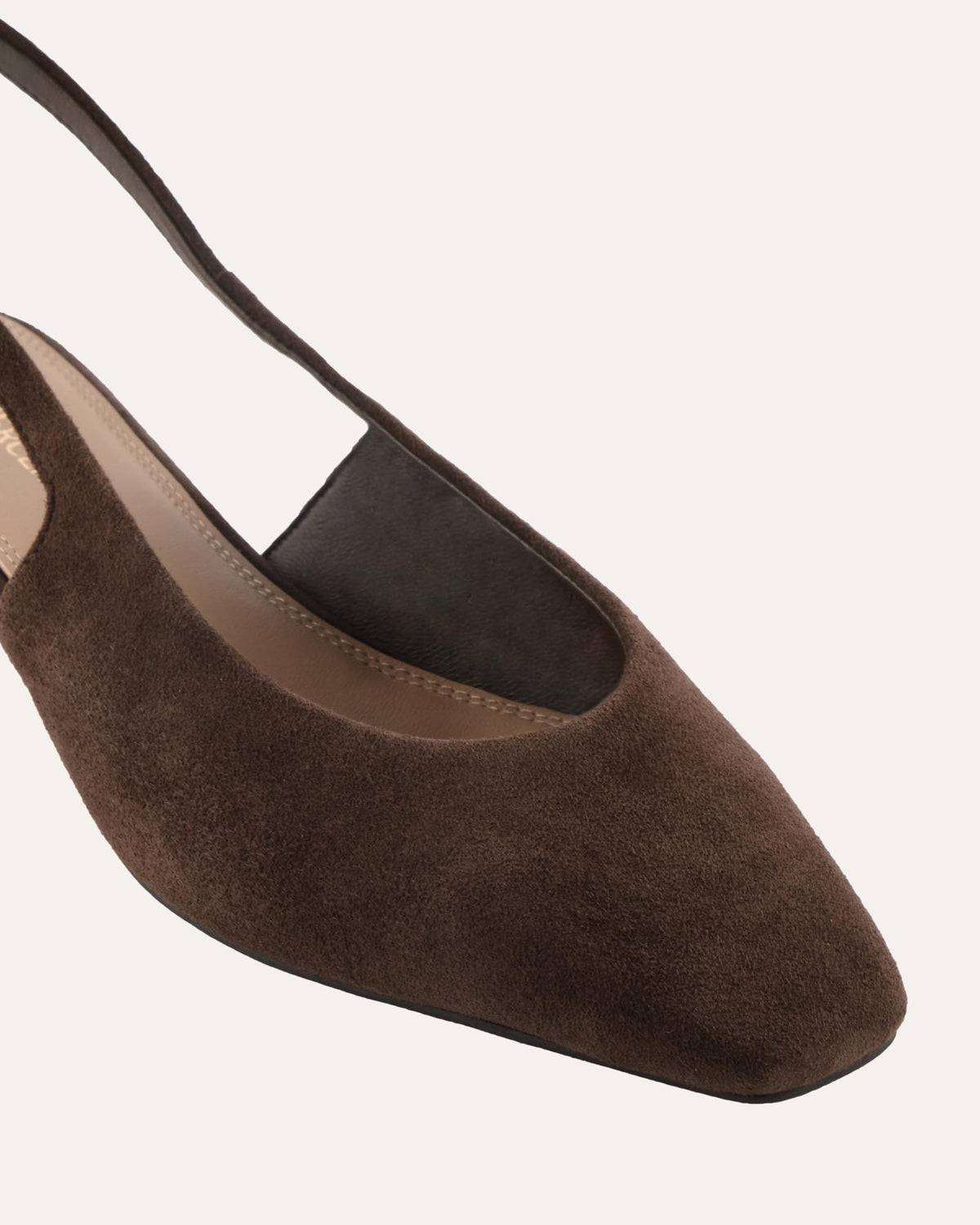 Brown suede shoe on a white background