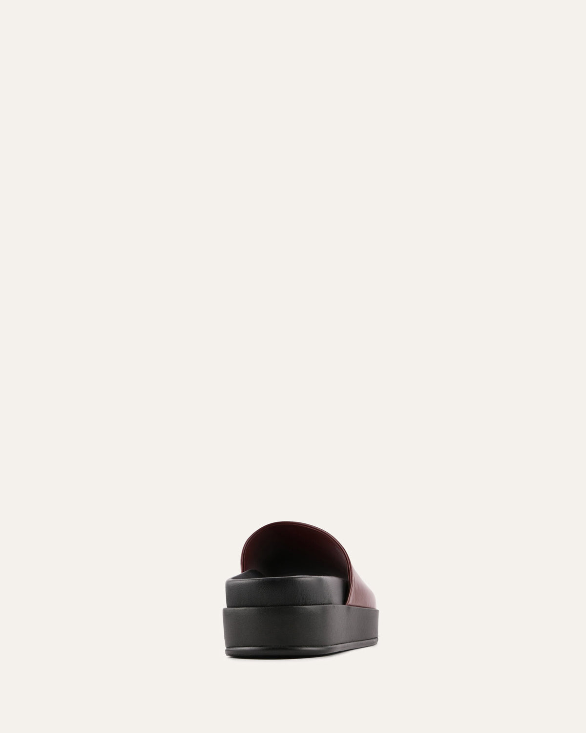 Black and red makeup brush on a white background